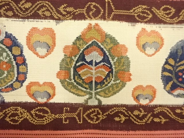  手織り紬　横段に抽象花模様織り出し　名古屋帯